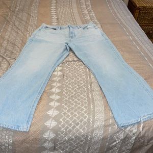 American Eagle stretch 90s distressed flare jeans